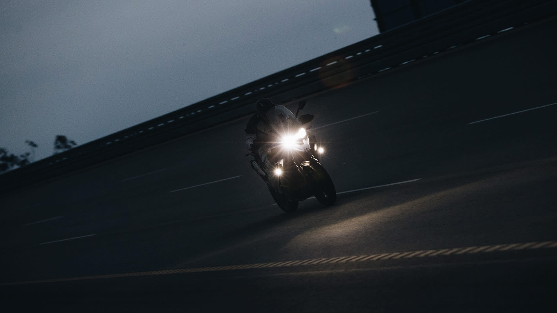 Iván Cervantes riding his Triumph Tiger 1200 GT Explorer at night